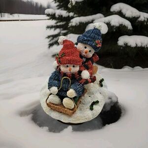 Home Interiors  sledding snowmen candle topper